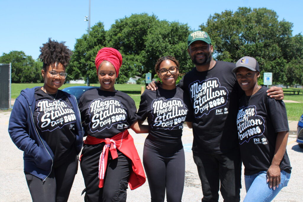 Megan Thee Stallion Day and Habitat for Humanity Volunteers in Black shirts